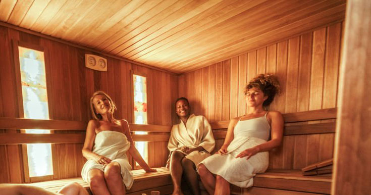 Group of friends enjoying their day in sauna